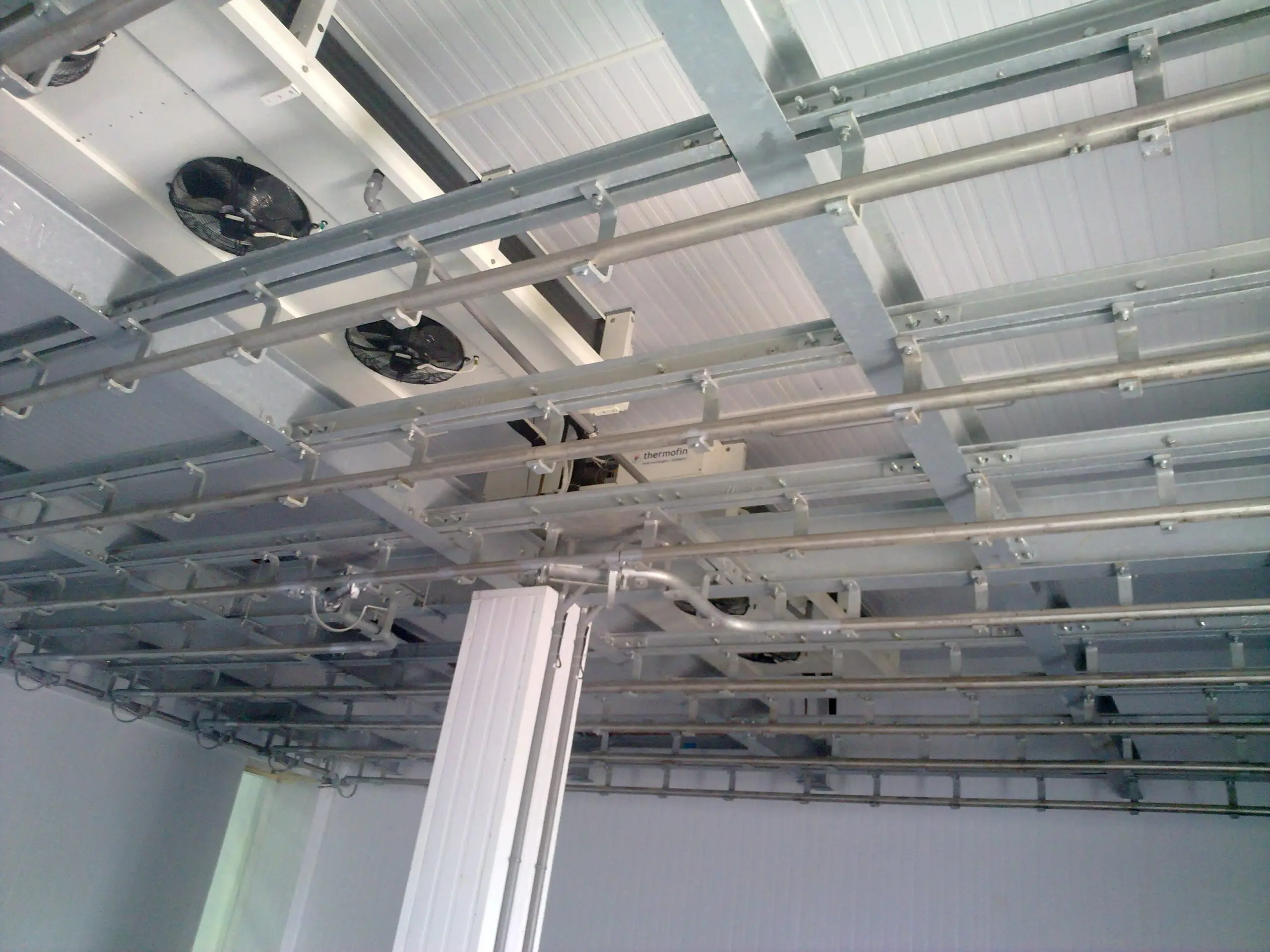 Ceiling-mounted cooling system installation